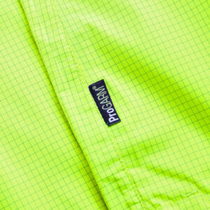 Bright green fabric with grid pattern